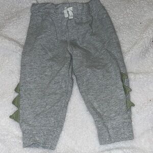 Carter’s dinosaur spike lined joggers, size 9 months